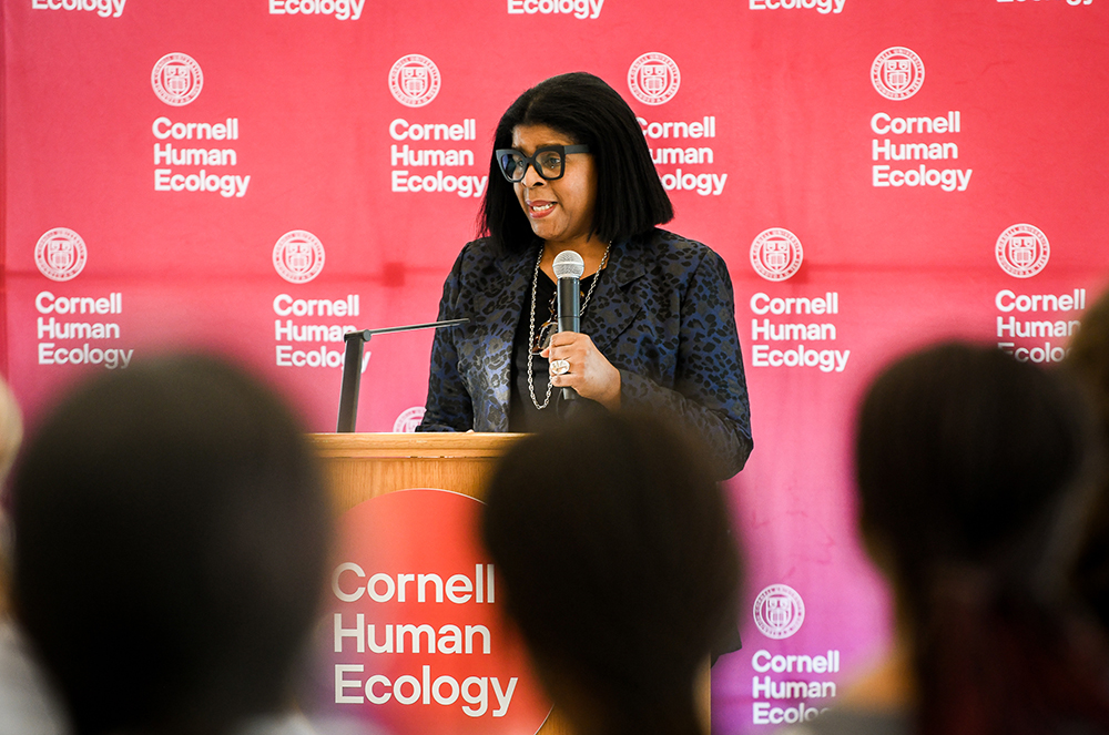 Woman speaking at a lectern