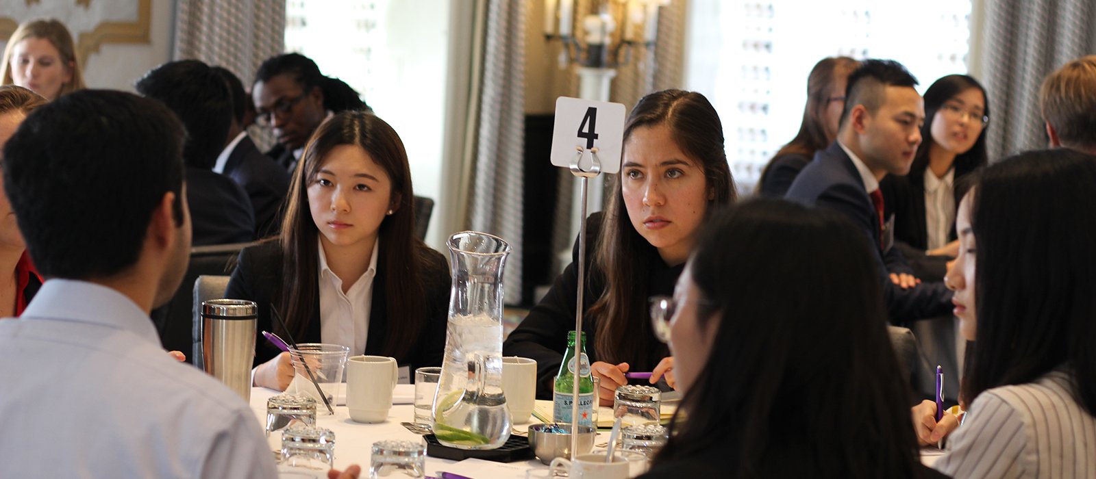 CIPA networking event in DC, students around a table