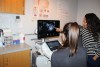 marla lujan at ultrasound machine with tech
