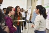 students chatting at experiential learning symposium