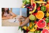 collage of fruit with photo of unidentifiable women in counseling session